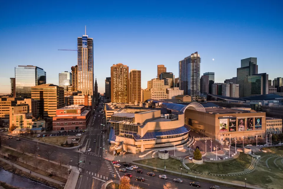 Aerial view of Denver, Colorado skyline at golden hour.